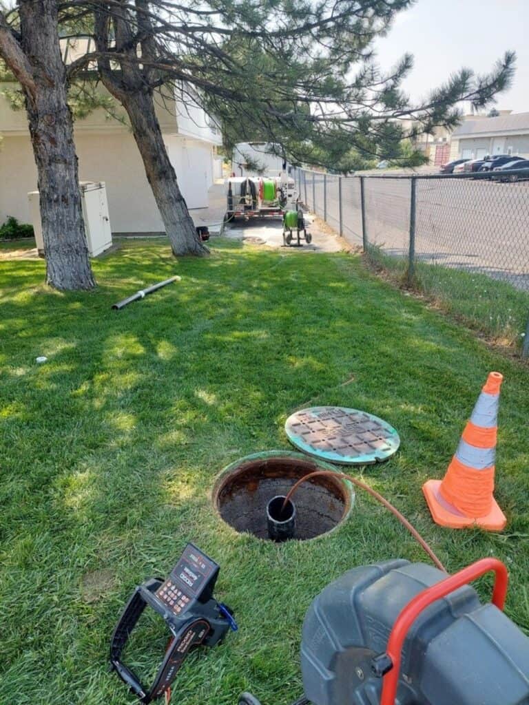 Pelican Underground LLC workers repairing a sewer line outdoors using trenchless equipment for safe, efficient service.