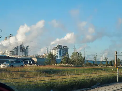 Pelican Underground Llc facility shows safe smoke release and clean surroundings, with power lines and roadside safety features.