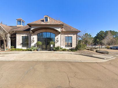 Pelican Underground LLC’s van is parked in front of a business, ready to help with trenchless sewer repairs.