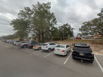 Pelican Underground Llc shows an orderly parking lot, giving a sense of calm and organization in a community area.
