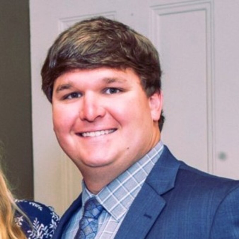 A happy Pelican Underground Llc team member stands smiling, showing confidence and friendliness to anyone viewing this image.